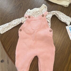 Adorable Pink Knit Bodysuit with Button Accents